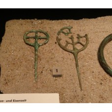 Wheel needles, bronze, solar cross design